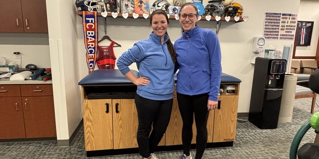 Kelly Angelucci, an expert physical therapist, stands with patient Lindsay, who sought physical therapy for help with her back pain